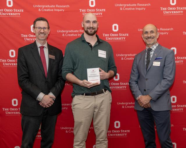 Dr. Wolfgang Pfeifer receives the Excellence in Undergraduate Research Mentoring Award with Dr. Norman Jones and Dr. Patrick Louchouarn