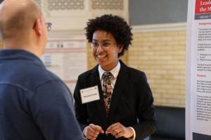 Hannah Fouts presenting at the research forum.