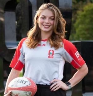 Kamorah photo holding rugby ball